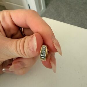 Kendra Scott gold and silver huggie earrings